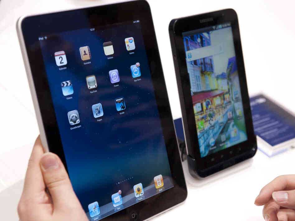 The CES is expected to feature more tablets to compete with the Apple iPad, left, and Samsung Galaxy Tab, right.