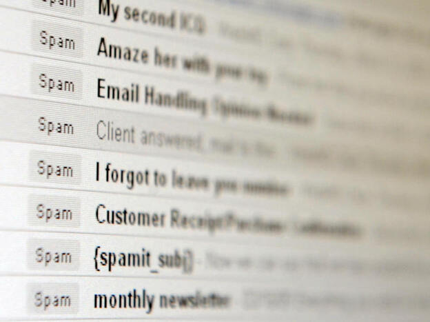 A computer screen inbox displaying spam.
