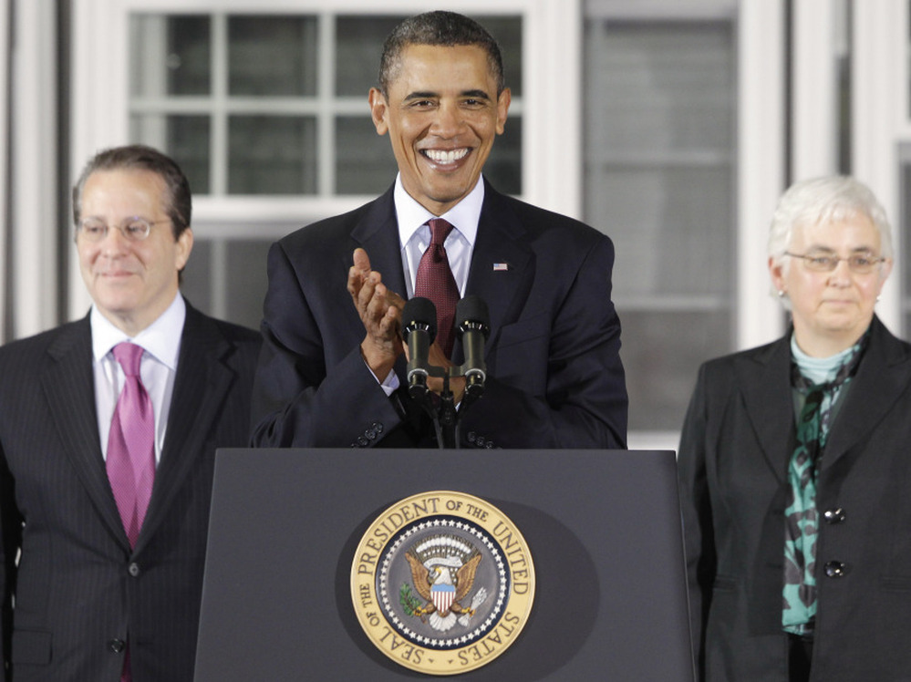 President Obama with Gene Sperling (l) his new director of the National Economic Council and Katharine G. Abraham, a new member of his Council of Economic Advisers.