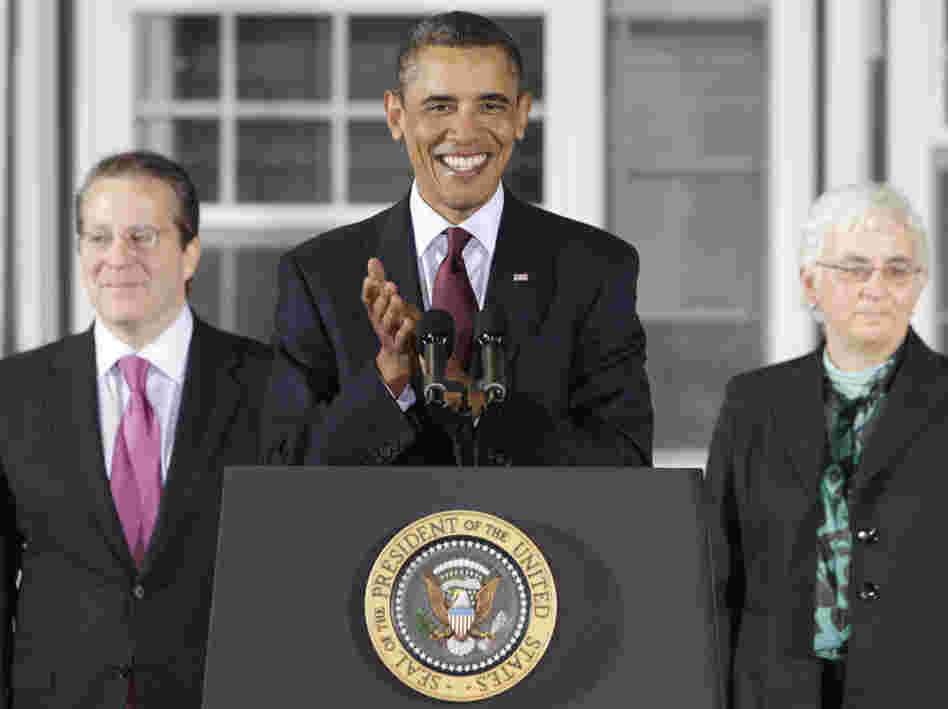 President Obama with Gene Sperling (l) his new director of the National Economic Council and Katharine G. Abraham, a new member of his Council of Economic Advisers.