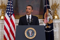 At the White House, President Obama tells Americans to keep