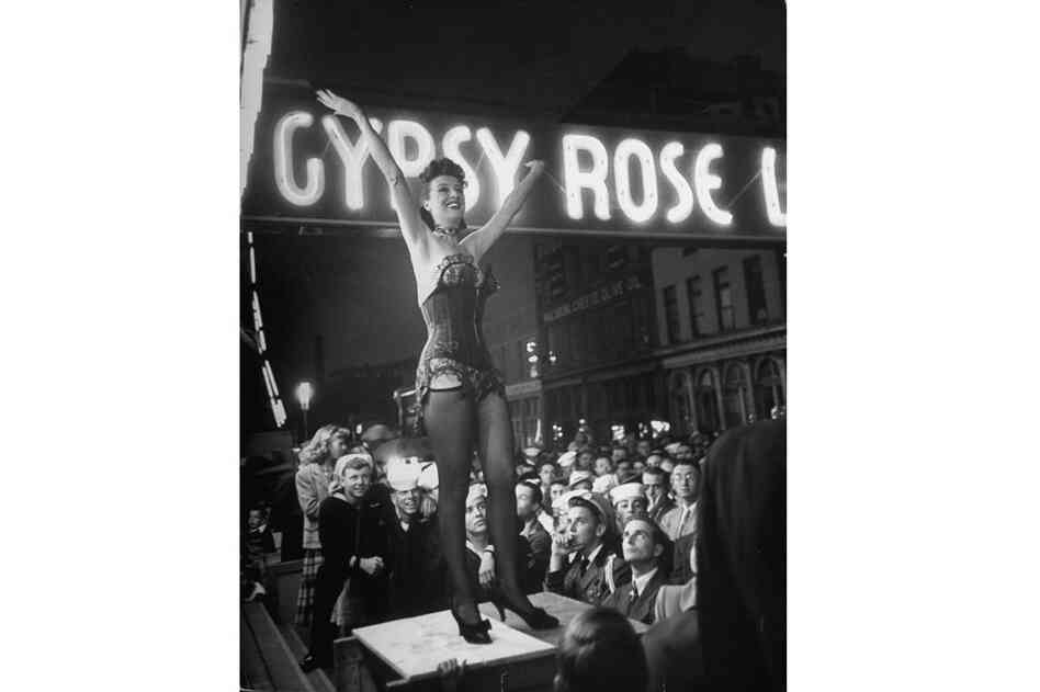 After her arrest for an "indecent performance," Gypsy once quipped "I wasn't naked. I was completely covered by a blue spotlight." Here, she performs during a traveling carnival show in 1954. 