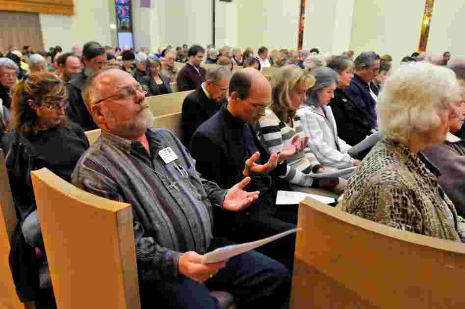 Parishioners attend an interfaith service at the Catalina United Methodist Church on Tuesday in Tucson. 