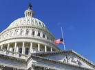The American flag flies at half-mast on the U.S. Capitol in Washington Sunday, Jan. 9, 2011. The American flag flies at half-mast on the U.S. Capitol in Washington Sunday, Jan. 9, 2011.
