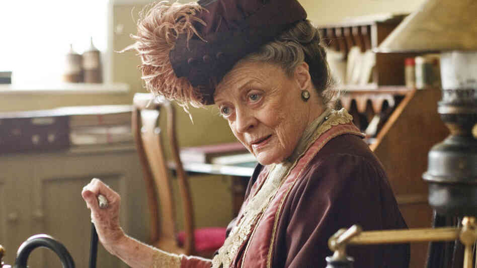 Dame Maggie Smith plays Violet, Dowager Countess of Grantham, in Downton Abbey. Dame Maggie Smith plays Violet, Dowager Countess of Grantham, in Downton Abbey.