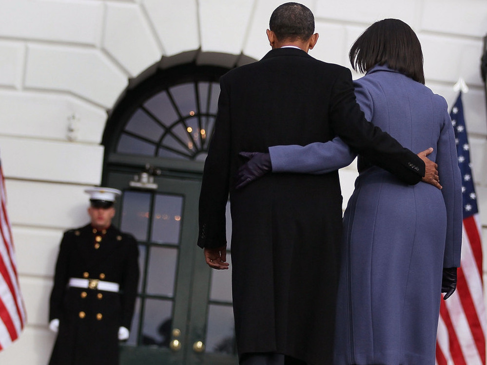 President Obama and first lady Michelle Obama depart Monday after observing a moment of silence to honor those killed and wounded during Saturday's shooting in Tucson, Ariz.