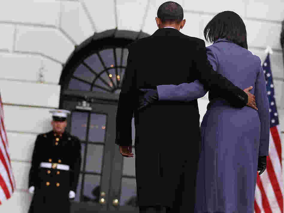 President Obama and first lady Michelle Obama depart Monday after observing a moment of silence to honor those killed and wounded during Saturday's shooting in Tucson, Ariz.