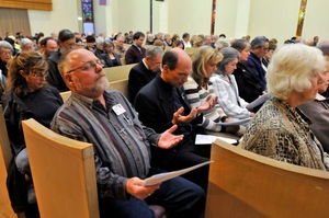 Parishioners attend an interfaith service at the Catalina United Methodist Church on Tuesday in Tucson.