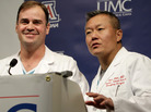 Dr. G. Michael Lemole, Jr., left, looks on as Dr. Peter Rhee talks about the condition of U.S. Rep. Gabrielle Giffords (D-AZ), at University Medical Center during a news conference in Tucson, Ariz., Monday, Jan. 10, 2011. Dr. G. Michael Lemole, Jr., left, looks on as Dr. Peter Rhee talks about the condition of U.S. Rep. Gabrielle Giffords (D-AZ), at University Medical Center during a news conference in Tucson, Ariz., Monday, Jan. 10, 2011.