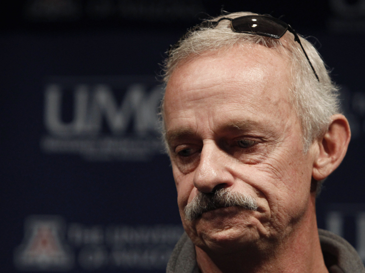 Bill Hileman, husband of injured shooting victim Susan Hileman, pauses as he describes his reaction after he found out his wife had been shot and that Christina Green, 9, who was with his wife at the time had died in the shooting.