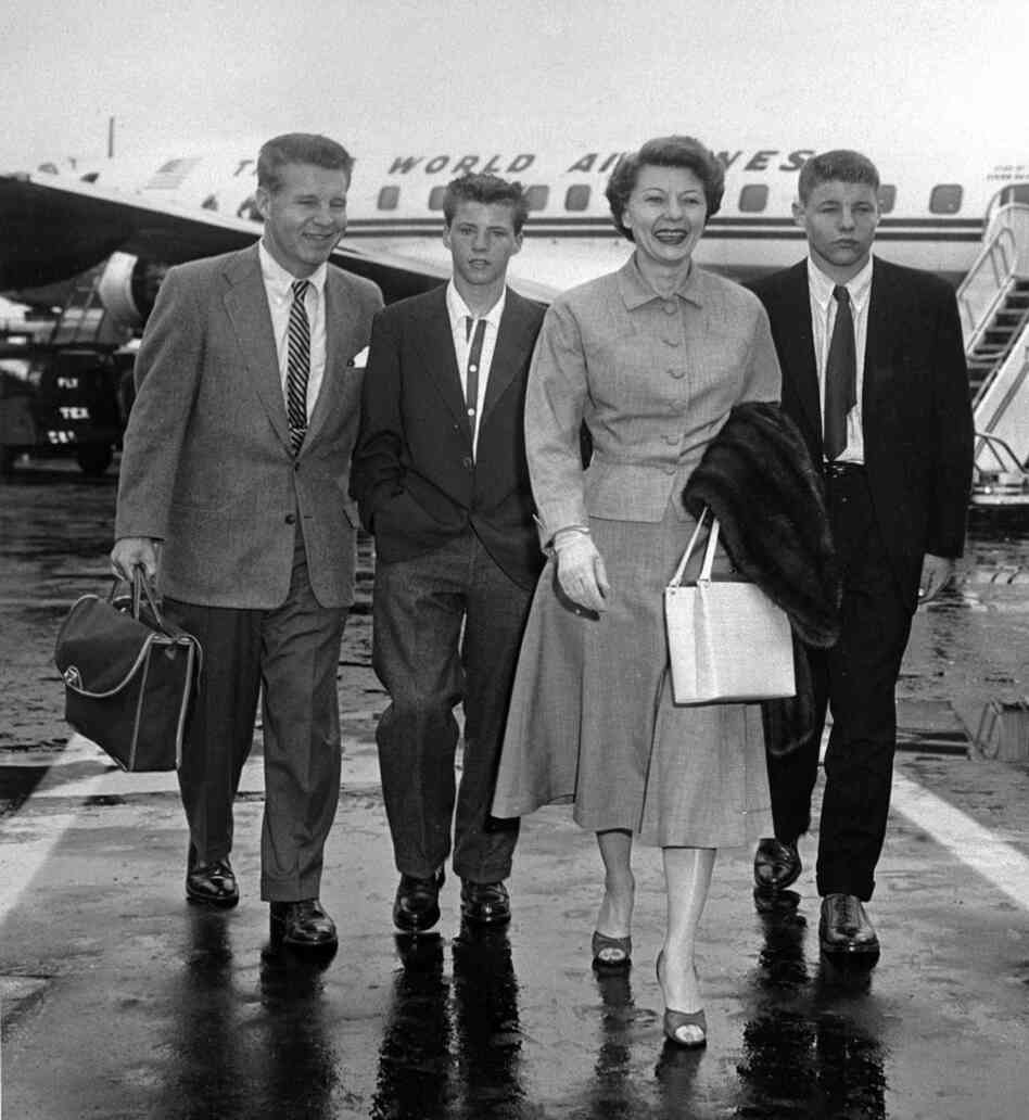 The Nelson family leaves for vacation in 1954: from left to right is Ozzie Nelson, Ricky Nelson, Harriet Nelson and David Nelson.