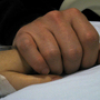 The hands of Mark Kelly and Rep. Gabrielle Giffords.