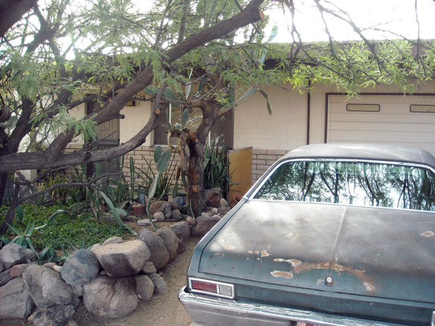 The home in Tucson, Ariz., where Jared Loughner, charged in a shooting that killed six and wounded more than a dozen, lived with his parents.
