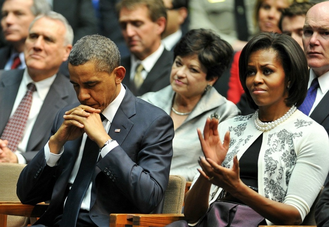 President Obama and first lady Michelle Obama attend the memorial event, "Together We Thrive: Tucson and America" in Tucson, Ariz., on Wednesday. The memorial is a tribute to the six people who were killed and 14 wounded in Saturday's shooting rampage.