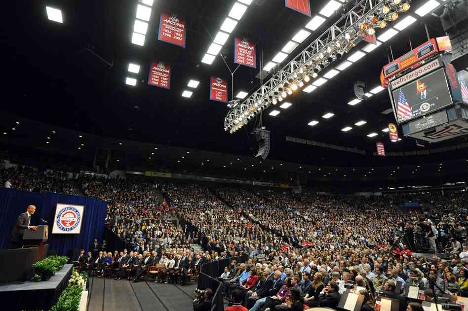 President Obama speaks to a crowd of 14,300 in the McKale Memorial Center, while another 13,000 watch on big screens in the nearby football stadium. 