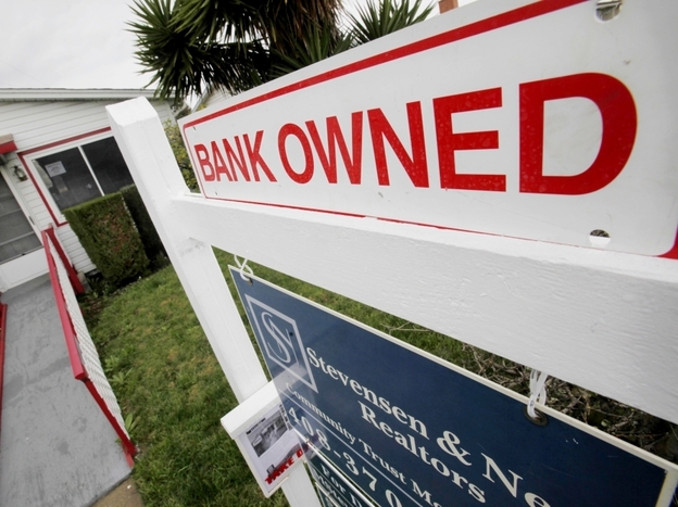 A foreclosed house is shown in East Palo Alto, Calif.
