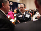 Reince Priebus talks with members during the Republican National Committee meeting on Friday in Oxon Hill, Md. Priebus was selected as RNC chairman after seven rounds of voting. Reince Priebus talks with members during the Republican National Committee meeting on Friday in Oxon Hill, Md. Priebus was selected as RNC chairman after seven rounds of voting.