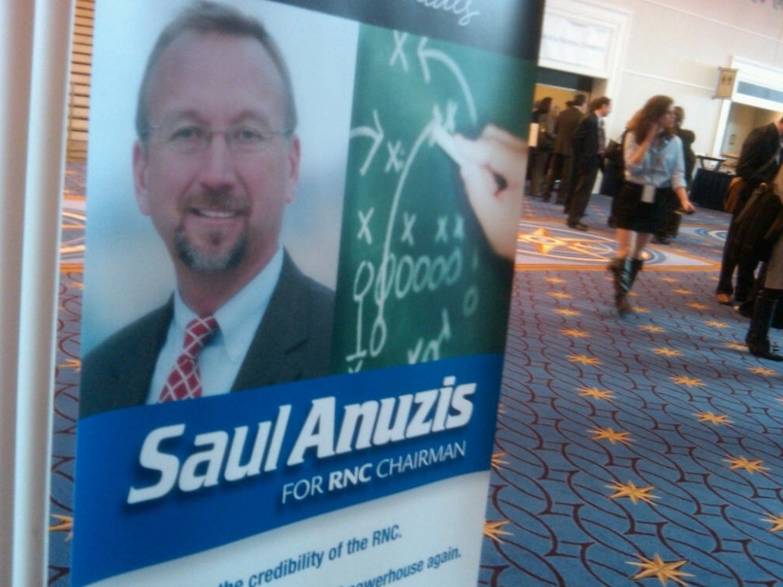 Saul Anuzis football play sign.