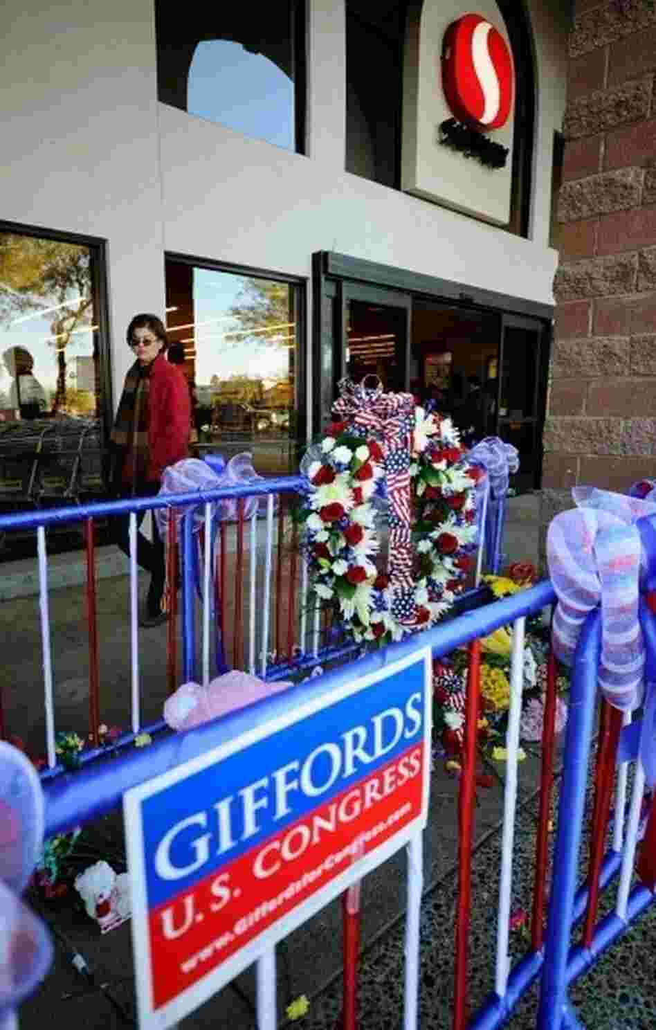 TUCSON, AZ - A makeshift memorial in front of the supermarket where U.S. Rep. Gabrielle Giffords (D-AZ) was shot in the head. The mass shooting killed six and injured several others. TUCSON, AZ - A makeshift memorial in front of the supermarket where U.S. Rep. Gabrielle Giffords (D-AZ) was shot in the head. The mass shooting killed six and injured several others.