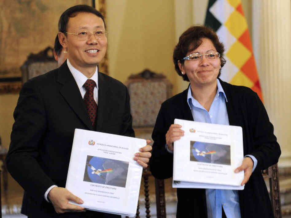 Tian Yunhai, China Development Bank's International Cooperation Deputy Director and Viviana Caro, Bolivia's Planning Minister, during the signing of $295 million loan to Bolivia. Tian Yunhai, China Development Bank's International Cooperation Deputy Director and Viviana Caro, Bolivia's Planning Minister, during the signing of $295 million loan to Bolivia.