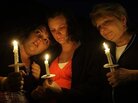 Relatives of Dean Jones, one of the 29 miners killed in the April 5 explosion of the Upper Big Branch mine, gathered for a vigil on April 10 with other families of the blast victims. From left are Julie Jones, Cassie Jones and Susan England. Relatives of Dean Jones, one of the 29 miners killed in the April 5 explosion of the Upper Big Branch mine, gathered for a vigil on April 10 with other families of the blast victims. From left are Julie Jones, Cassie Jones and Susan England.
