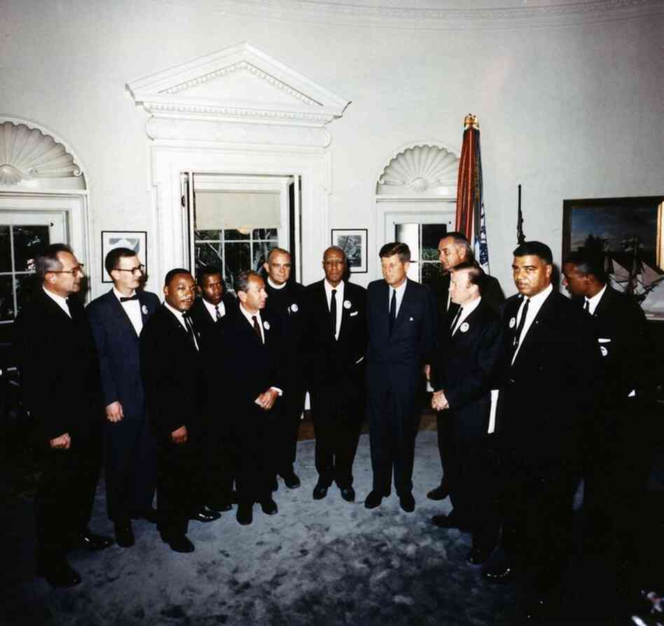 President Kennedy meets with the leaders of the March On Washington in the Oval Office on Aug. 28, 1963. At the meeting were (from left to right)  Labor Secretary Willard Wirtz, Mathew Ahmann, Rev. Martin Luther King Jr., John Lewis, Rabbi Joachim Prinz, Rev. Eugene Carson Blake, A. Philip Randolph, President Kennedy, Vice President  Lyndon Johnson, Walter Ruether, Whitney Young, Floyd McKissic...