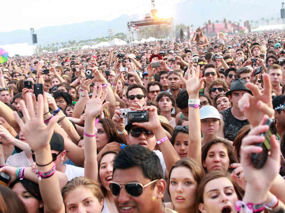 INDIO, CA - APRIL 17:  Music fans in the audience during day two of the Coachella Valley Music & Arts Festival 2010