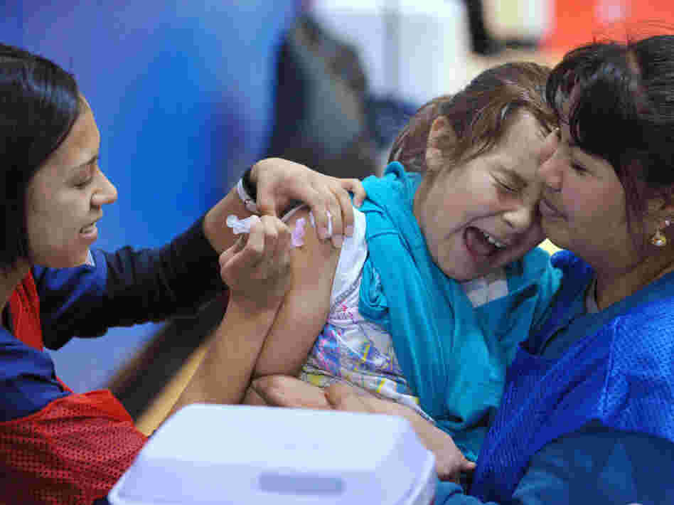 A student at Carlin Springs Elementary School receives a flu shot last January in Arlington, Va.