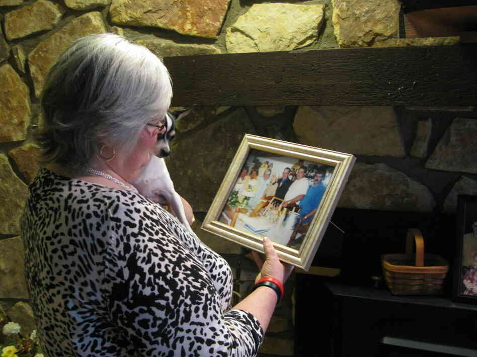 Judy Jones Petersen, with a treasured photo of her family.