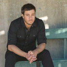 On "Mission Bell," Amos Lee keeps coming back to the idea that moving on means leaving things behind.