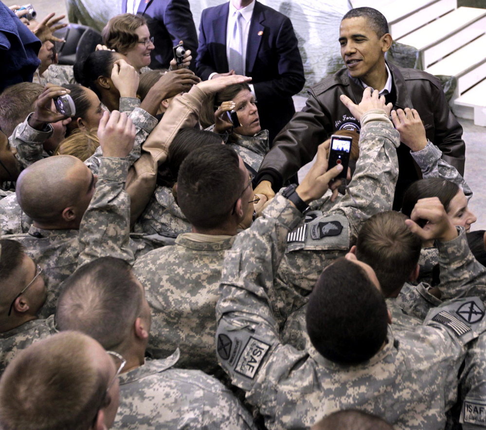 President Obama greets troops at a rally during an unannounced visit at Bagram Air Field in Afghanistan on Dec. 3, 2010.