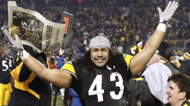 Pittsburgh Steelers safety Troy Polamalu celebrates after his team beat the New York Jets, 24-19, on Sunday to win the AFC championship game in Pittsburgh.