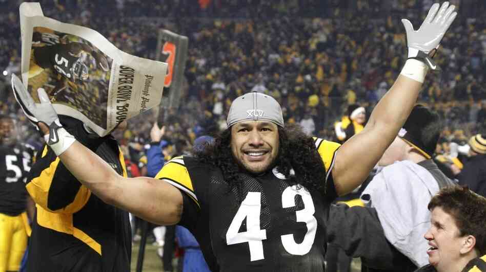 Pittsburgh Steelers safety Troy Polamalu celebrates after his team beat the New York Jets, 24-19, on Sunday to win the AFC championship game in Pittsburgh.