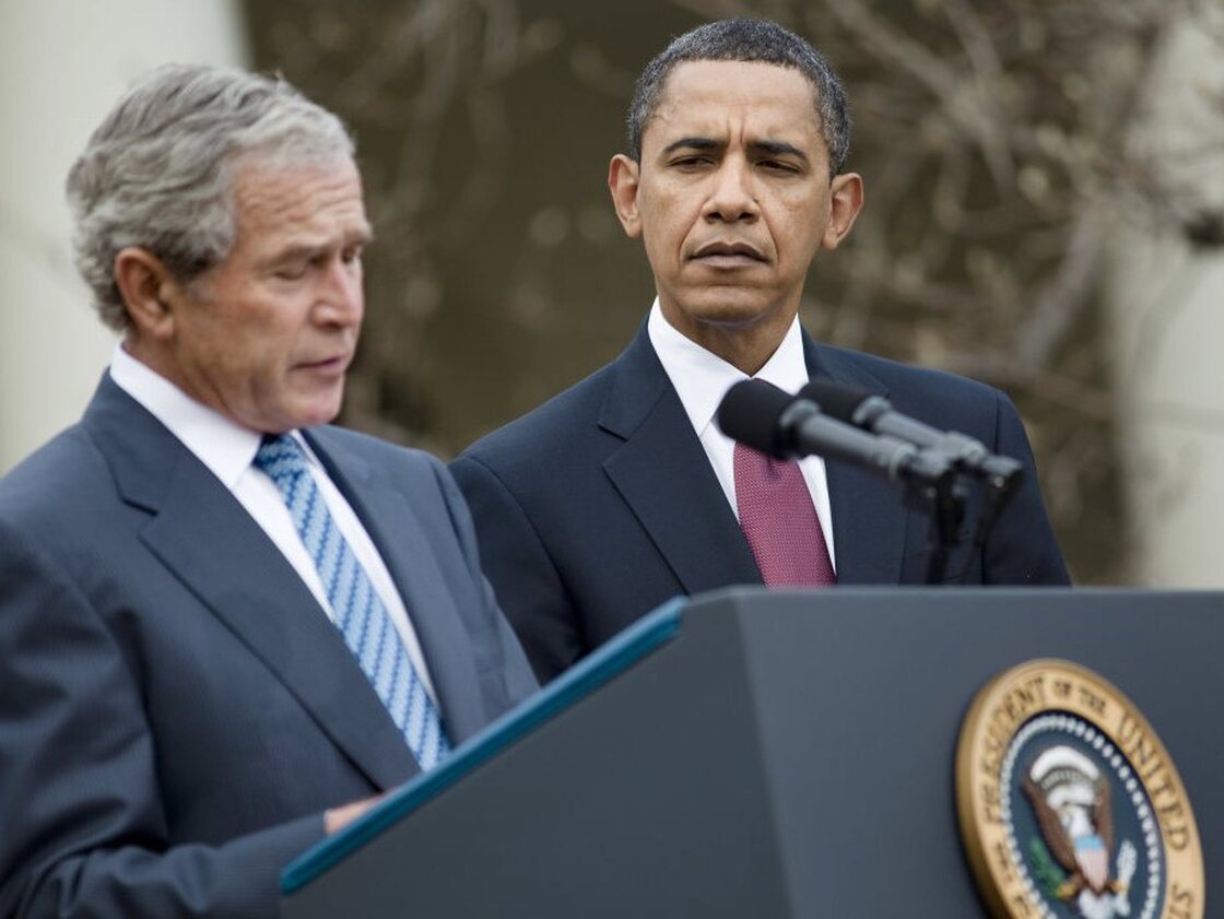 President Barack Obama listens as former President George W. Bush speaks during a press conference in the Rose Garden of the White House last January.