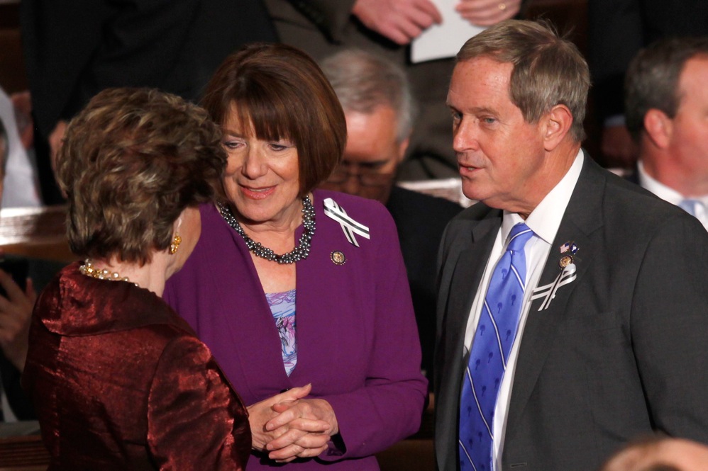 Rep. Joe Wilson (R-SC), right, talks with Del. Madeleine Bordallo (D-Guam), left, and Rep. Susan Davis, (D-CA). 