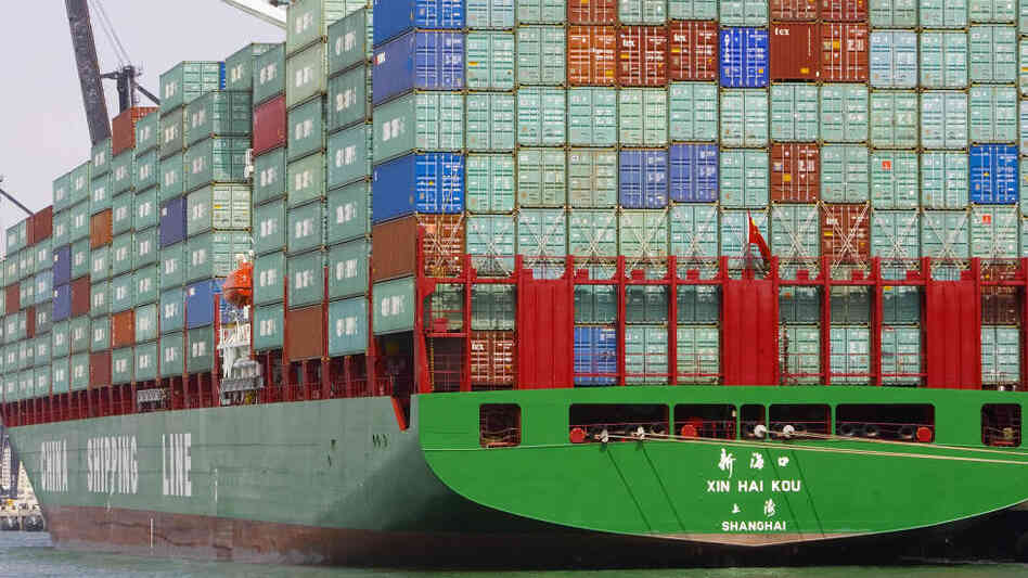 Containerized cargo is stacked high on a China Shipping Line freighter in 2006 in Miami Beach, Florida. Despite China's growing economy, author Daniel Altman believes cultural and demographic factors will prevent it from overtaking the United States as an economic power. Containerized cargo is stacked high on a China Shipping Line freighter in 2006 in Miami Beach, Florida. Despite China's growing economy, author Daniel Altman believes cultural and demographic factors will prevent it from overtaking the United States as an economic power.
