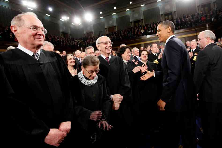 Obama greets Supreme Court justices Anthony Kennedy (from left), Ruth Bader Ginsburg, Stephen Breyer, Sonia Sotomayor and Elena Kagan. 