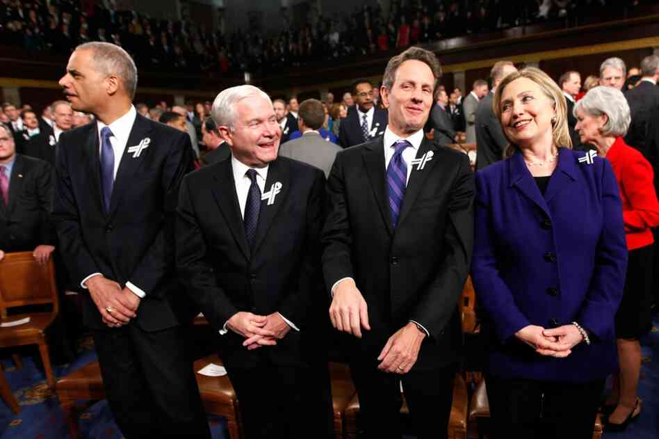 Attorney General Eric Holder (from left), Defense Secretary Robert Gates, Treasury Secretary Tim Geithner and Secretary of State Hillary Clinton await Obama's address. 