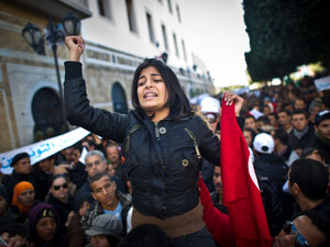 A woman participates in a demonstration in Tunis on January 22, 2011. A woman participates in a demonstration in Tunis on January 22, 2011.