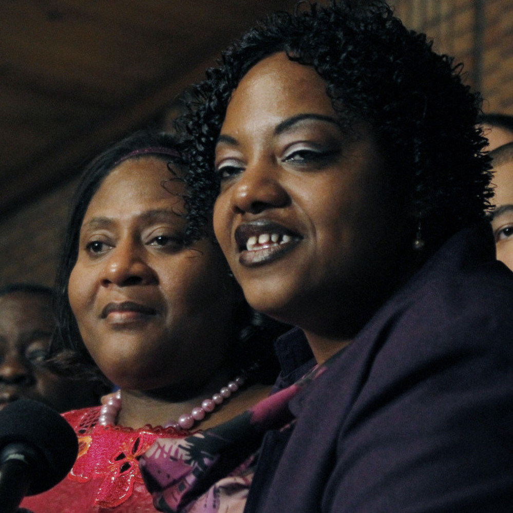 Jamie Scott, left, and her sister Gladys Scott answer questions during a news conference in Jackson, Miss., Friday, Jan. 7, 2011.