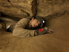 Meet the cataphiles: Daniel Garnier-Moiroux crawls through a very tight section of the Paris catacombs. Meet the cataphiles: Daniel Garnier-Moiroux crawls through a very tight section of the Paris catacombs.