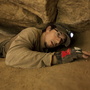 Meet the cataphiles: Daniel Garnier-Moiroux crawls through a very tight section of the Paris catacombs. Meet the cataphiles: Daniel Garnier-Moiroux crawls through a very tight section of the Paris catacombs.