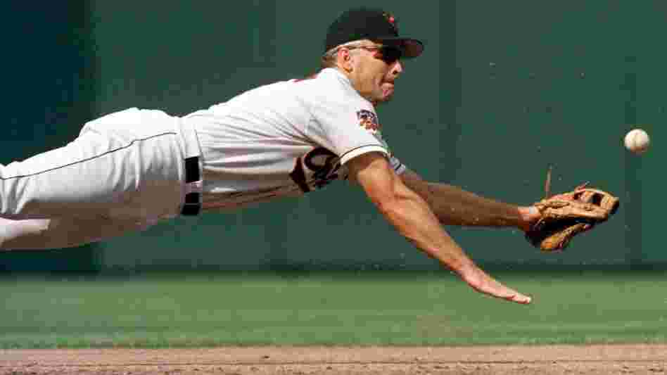 Baltimore Oriole Cal Ripken Jr. dives for a ball during a game against the Cleveland Indians on Sept. 15, 1997.