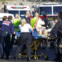 Emergency personnel attend to a shooting victim outside a Safeway in Tucson, Ariz. Rep. Gabrielle Giffords (D-AZ), and others were shot as the congresswoman was meeting with constituents. First responders to the scene used special first aid kits to help treat victims until medical personnel arrived. Emergency personnel attend to a shooting victim outside a Safeway in Tucson, Ariz. Rep. Gabrielle Giffords (D-AZ), and others were shot as the congresswoman was meeting with constituents. First responders to the scene used special first aid kits to help treat victims until medical personnel arrived.