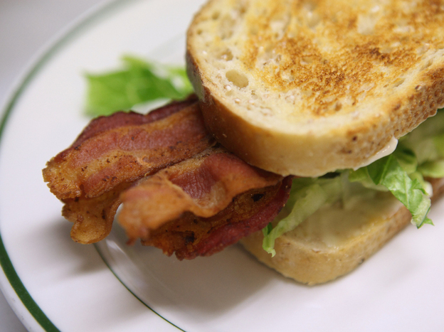Bacon is cut from the pig's belly, and is one- to two-thirds fat.