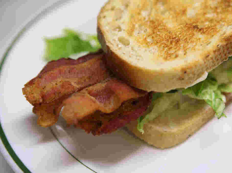 Bacon is cut from the pig's belly, and is one- to two-thirds fat.