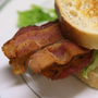 Bacon is cut from the pig's belly, and is one- to two-thirds fat.