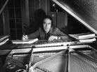 John Barry at his piano John Barry at his piano