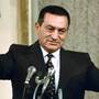Mubarak waves to parliament on Oct. 12, 1993, after being sworn in for a third six-year term as President. He was the only presidential candidate and won a 96 percent "yes vote" in a national referendum on Oct. 4.