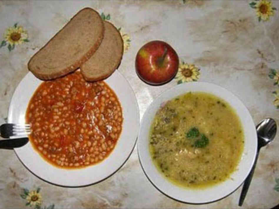 Ústí nad Labem, Czech Republic, 2010. Beans with tomato sauce, pea soup, apple, wheat and rye bread.  